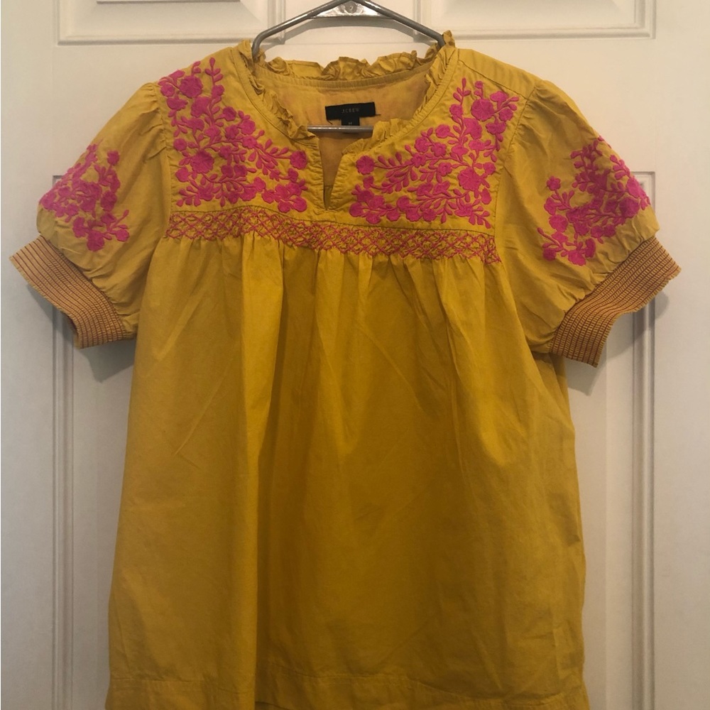 Eye catching blouse. J.Crew size Medium